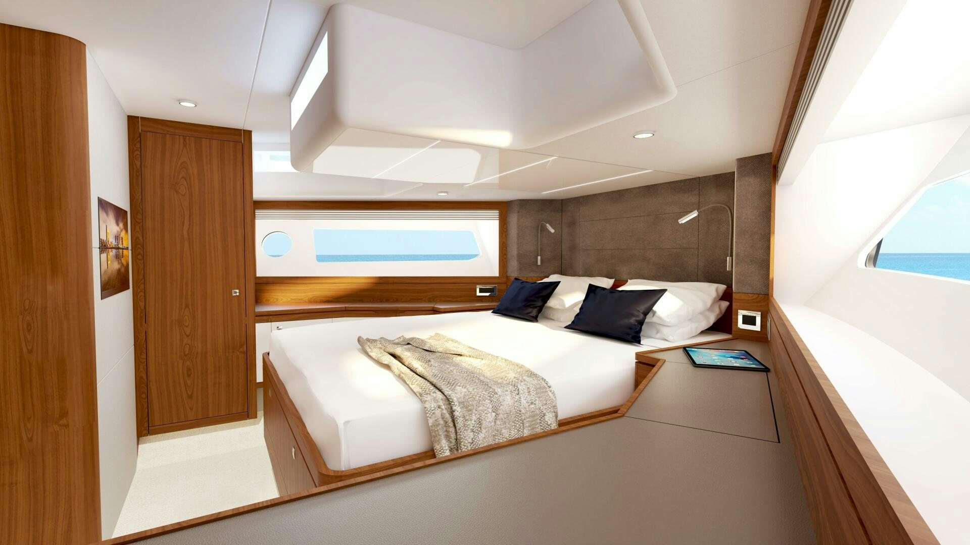 a room with a bed and a desk aboard JOHNSON 70 SKYLOUNGE NEW BUILD Yacht for Sale