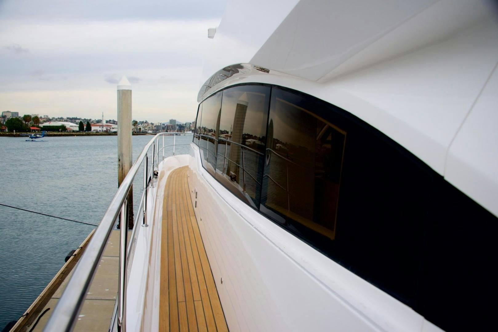 a boat on the water aboard JOHNSON 70 SKYLOUNGE NEW BUILD Yacht for Sale