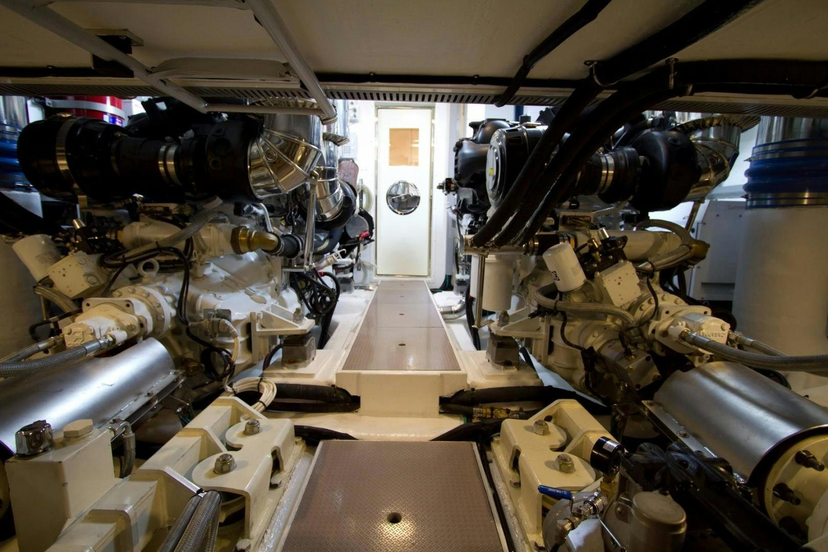 a large room with many machines aboard JOHNSON 70 SKYLOUNGE NEW BUILD Yacht for Sale