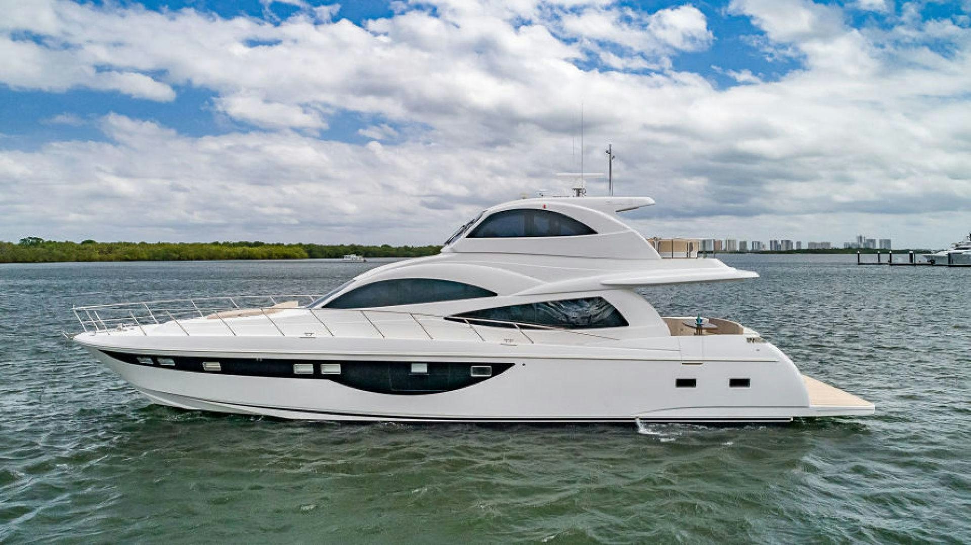 a white yacht in the water aboard No Name Yacht for Sale