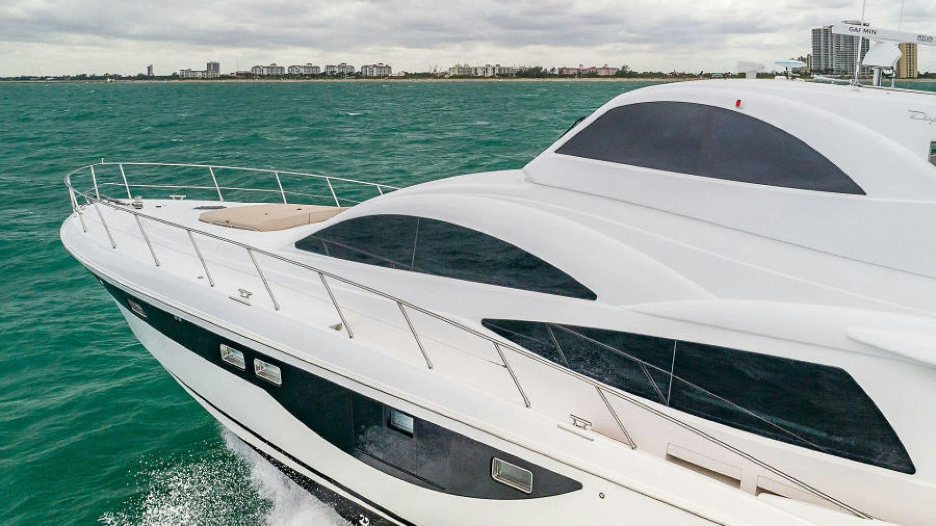 a white boat in the water aboard No Name Yacht for Sale