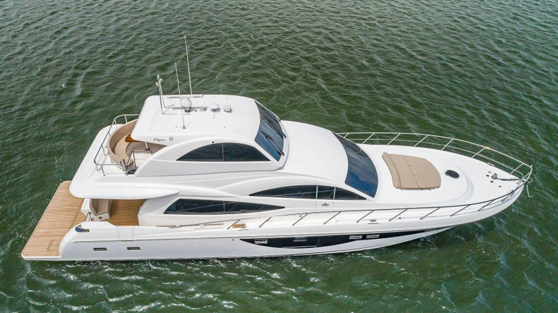 a white yacht in the water aboard No Name Yacht for Sale