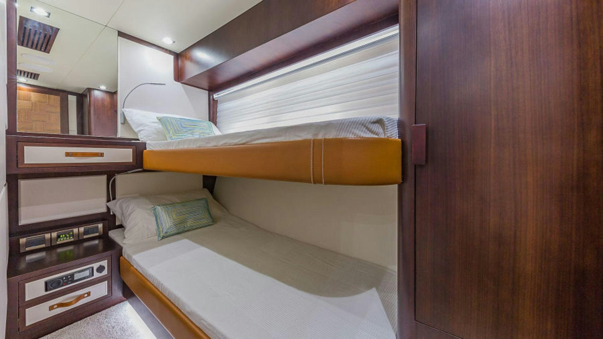 a room with bunk beds aboard No Name Yacht for Sale