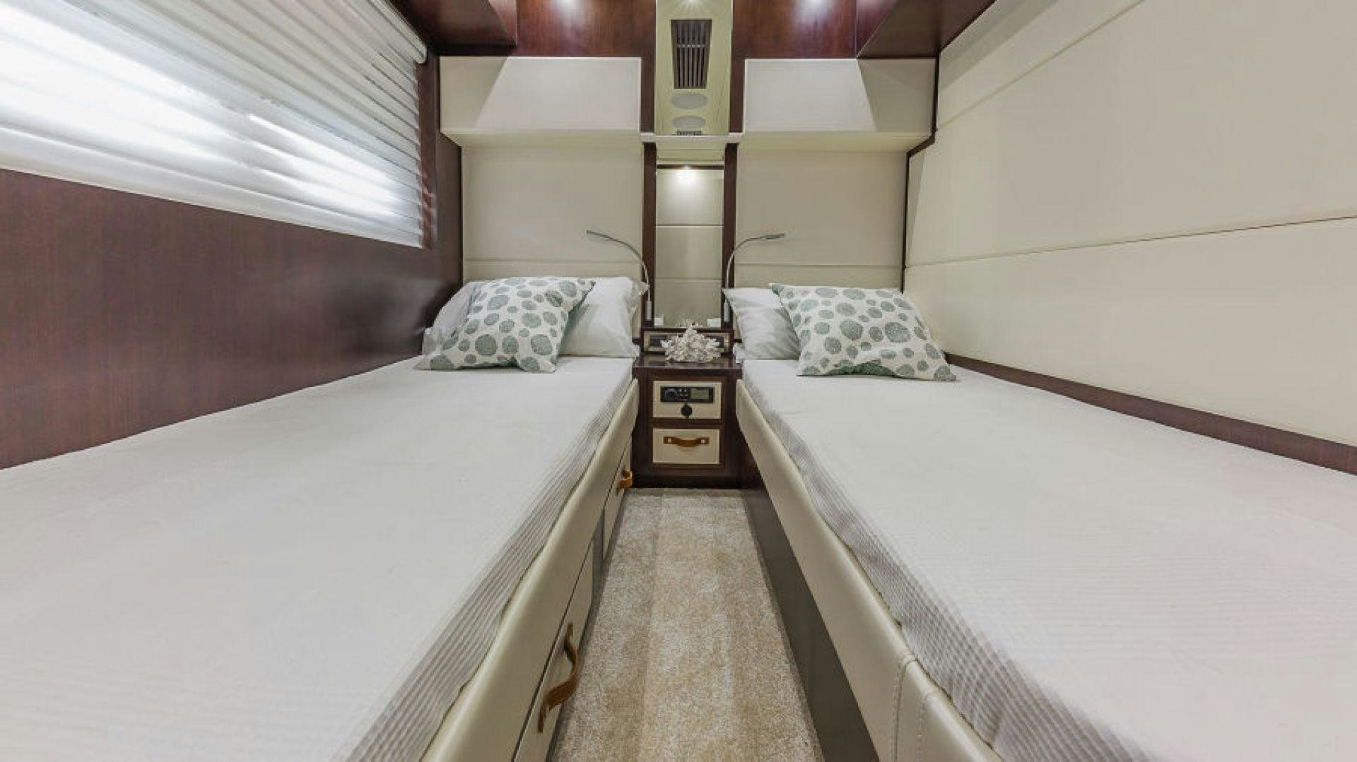 a room with two beds aboard No Name Yacht for Sale