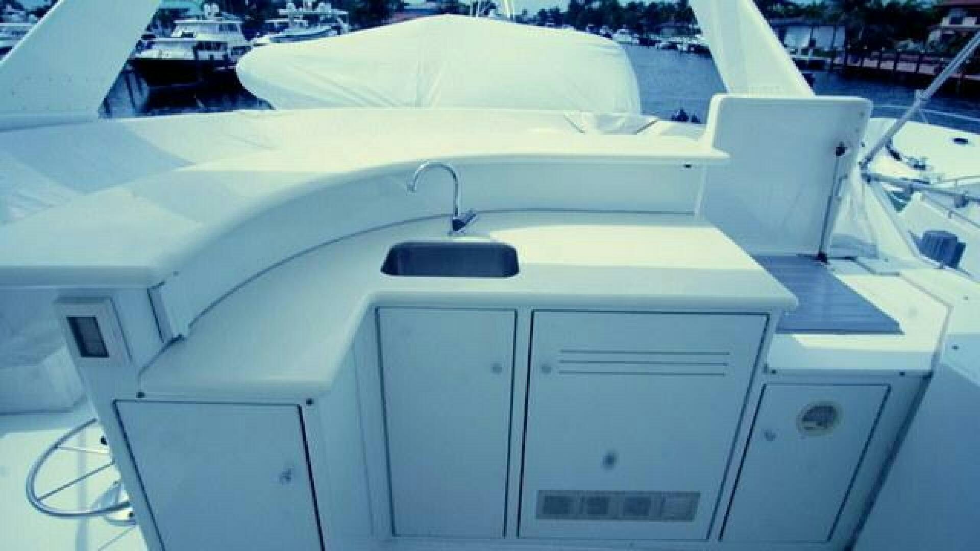 a white machine with a black handle aboard SILVER SEAS Yacht for Sale