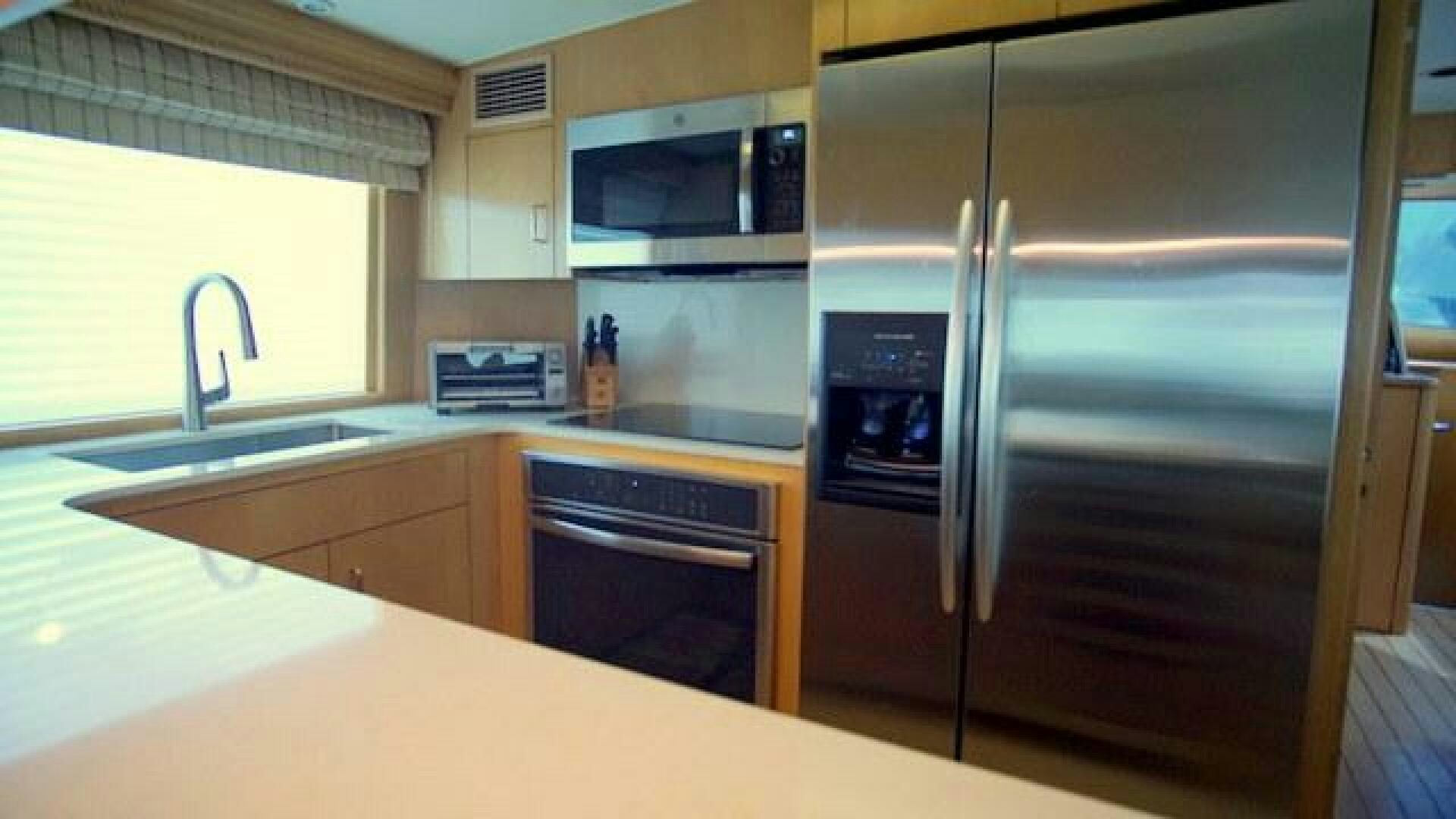 a kitchen with stainless steel appliances aboard SILVER SEAS Yacht for Sale
