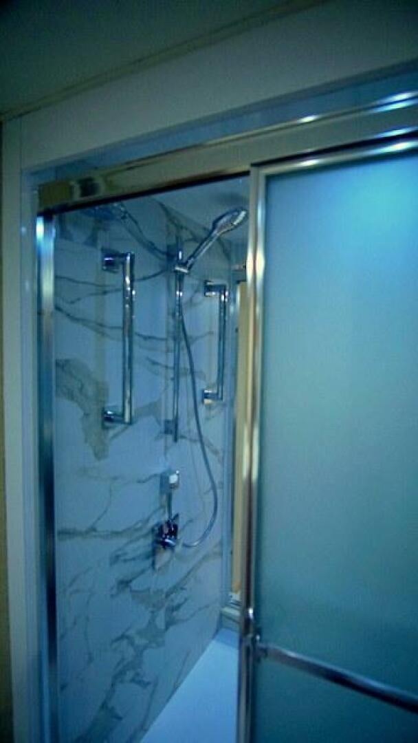 a door with a glass window aboard SILVER SEAS Yacht for Sale