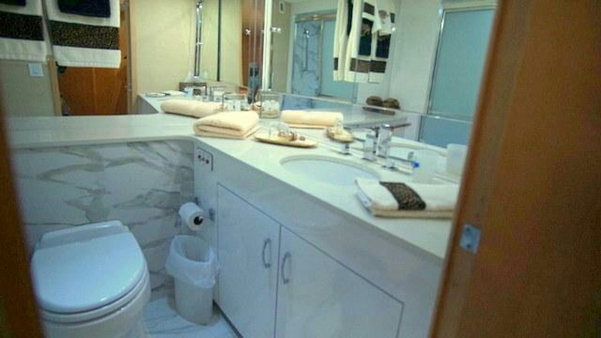 a bathroom with a sink and toilet aboard SILVER SEAS Yacht for Sale