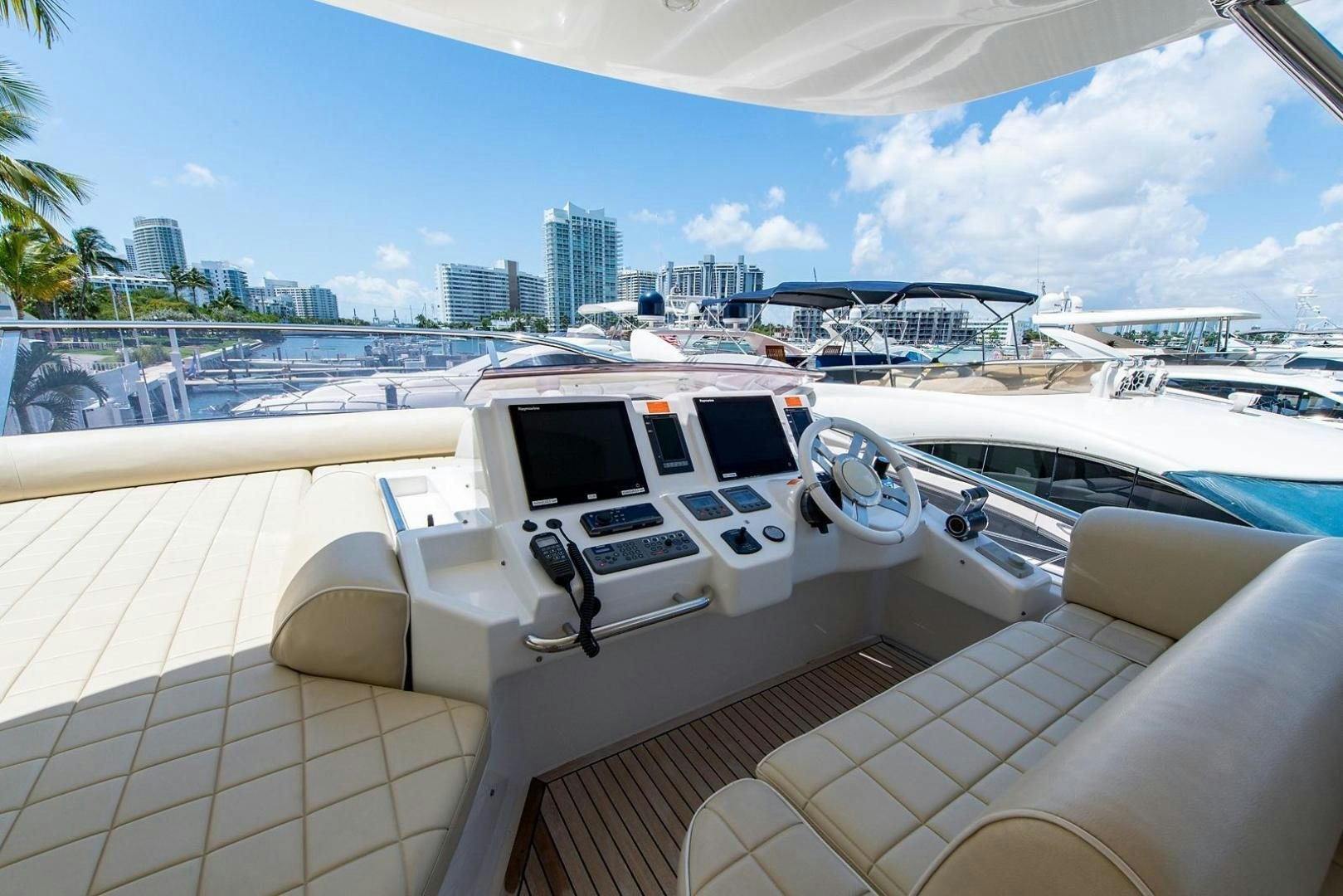 a white car on a deck aboard SOMEWHERE I BELONG Yacht for Sale