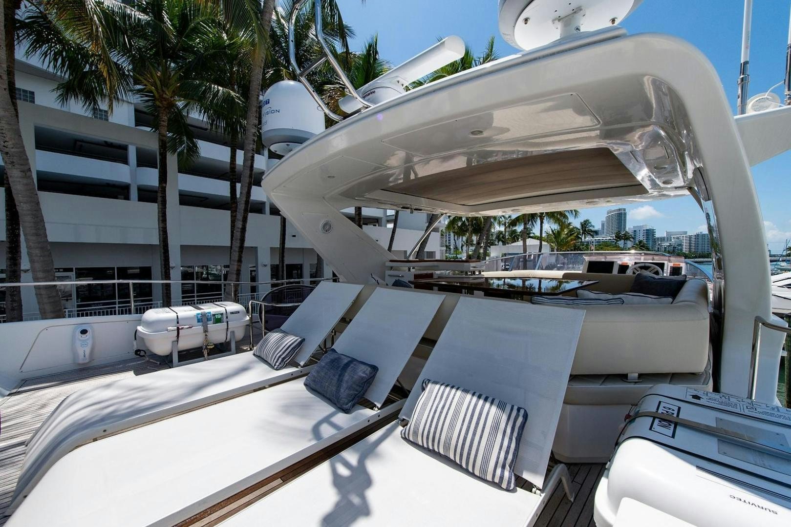 a boat on a deck aboard SOMEWHERE I BELONG Yacht for Sale