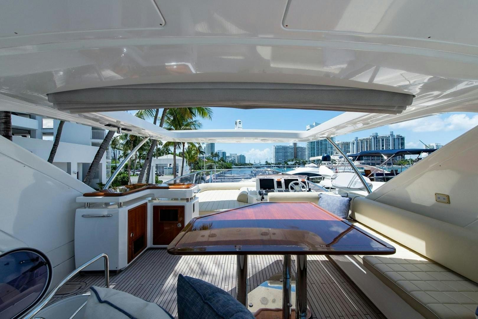 a boat in a harbor aboard SOMEWHERE I BELONG Yacht for Sale