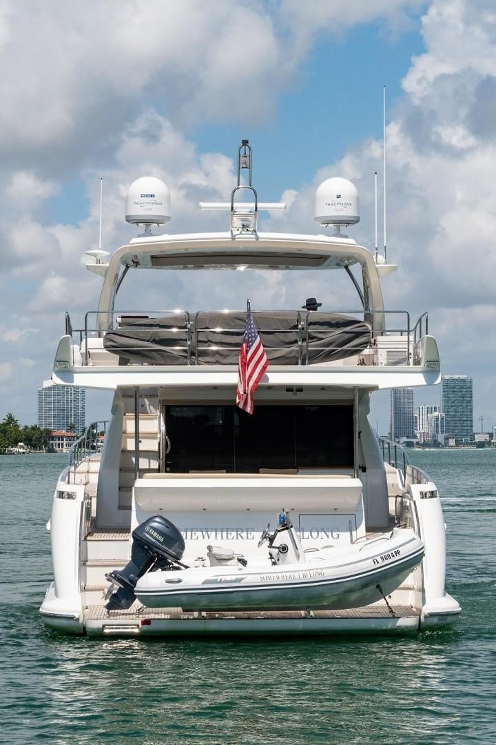 a boat on the water aboard SOMEWHERE I BELONG Yacht for Sale