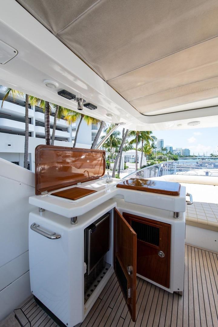 a boat with a large pot on the front aboard SOMEWHERE I BELONG Yacht for Sale