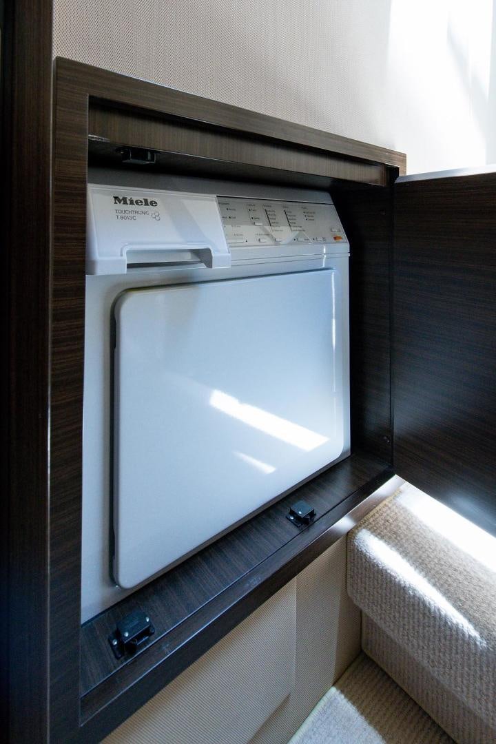 a microwave oven in a cabinet aboard SOMEWHERE I BELONG Yacht for Sale