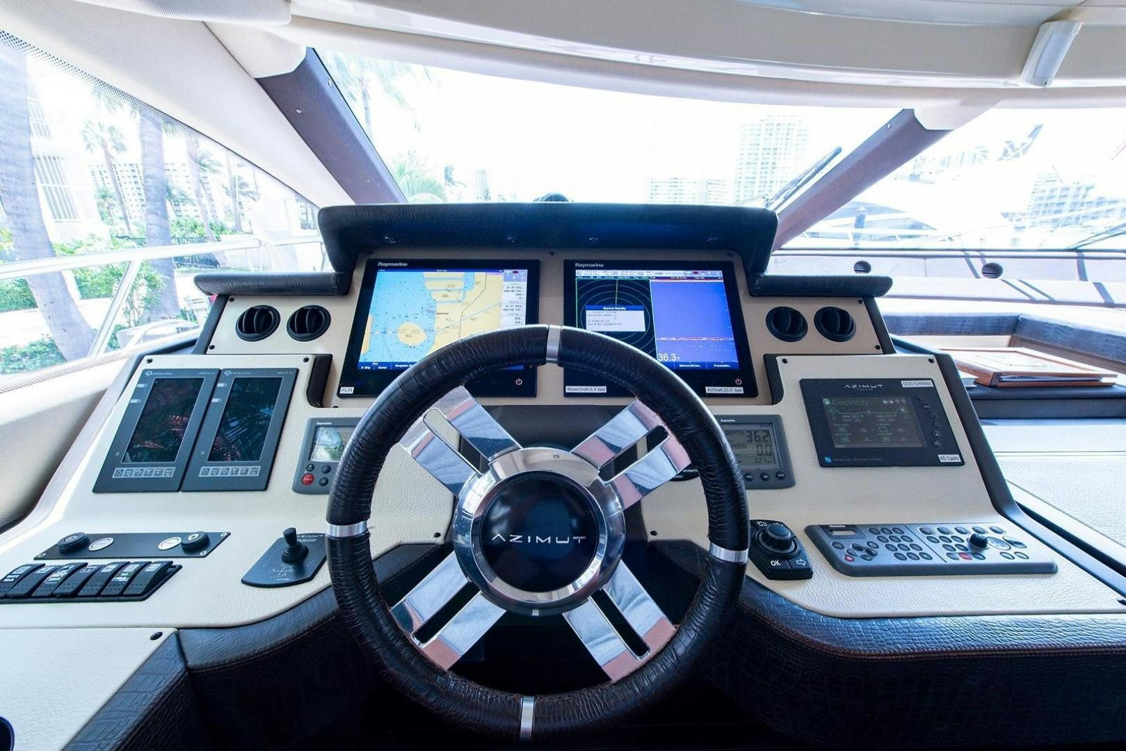 a car with many screens aboard SOMEWHERE I BELONG Yacht for Sale