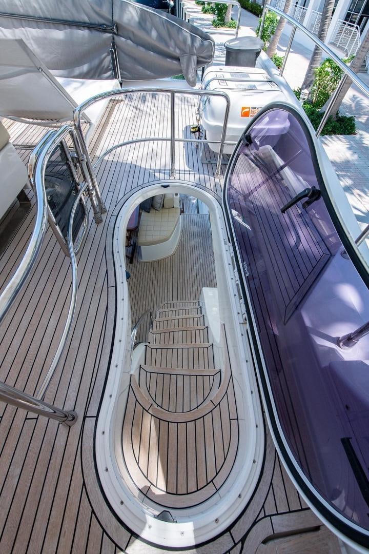 a car parked in a parking lot aboard SOMEWHERE I BELONG Yacht for Sale