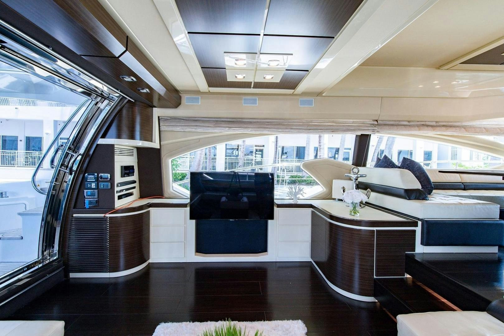 a room with a table and chairs aboard SOMEWHERE I BELONG Yacht for Sale