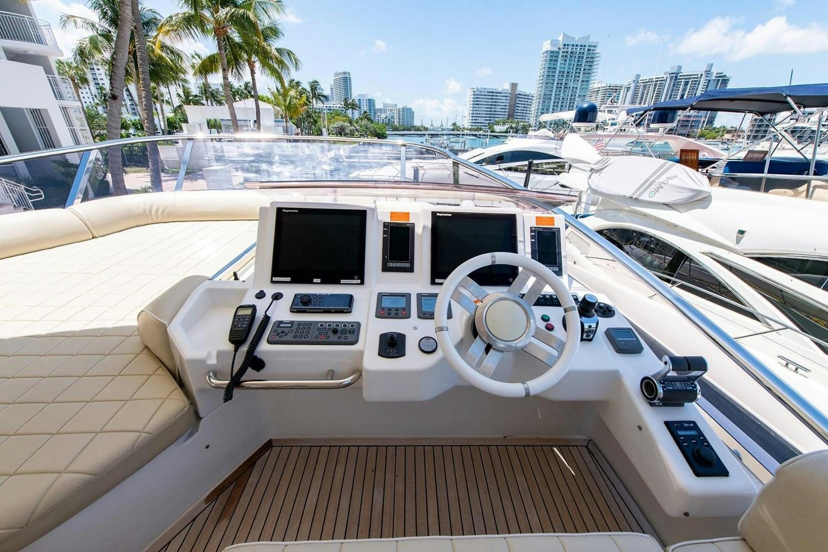 a white car on a boat aboard SOMEWHERE I BELONG Yacht for Sale