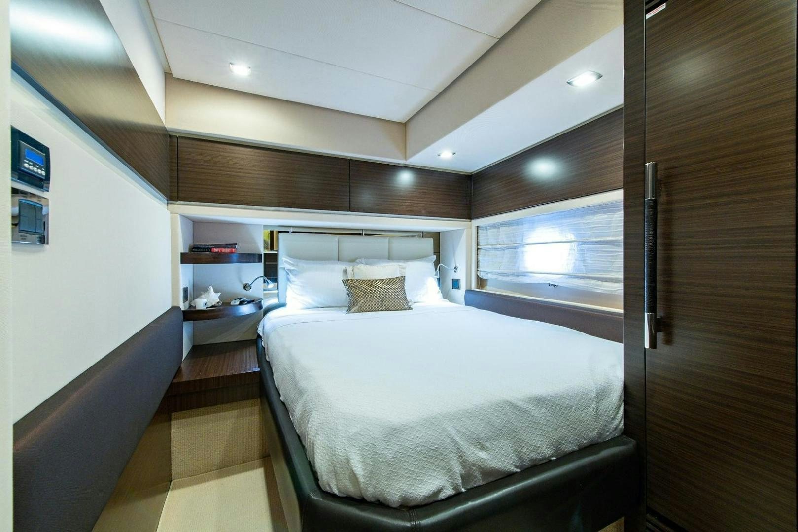 a bed in a room aboard SOMEWHERE I BELONG Yacht for Sale