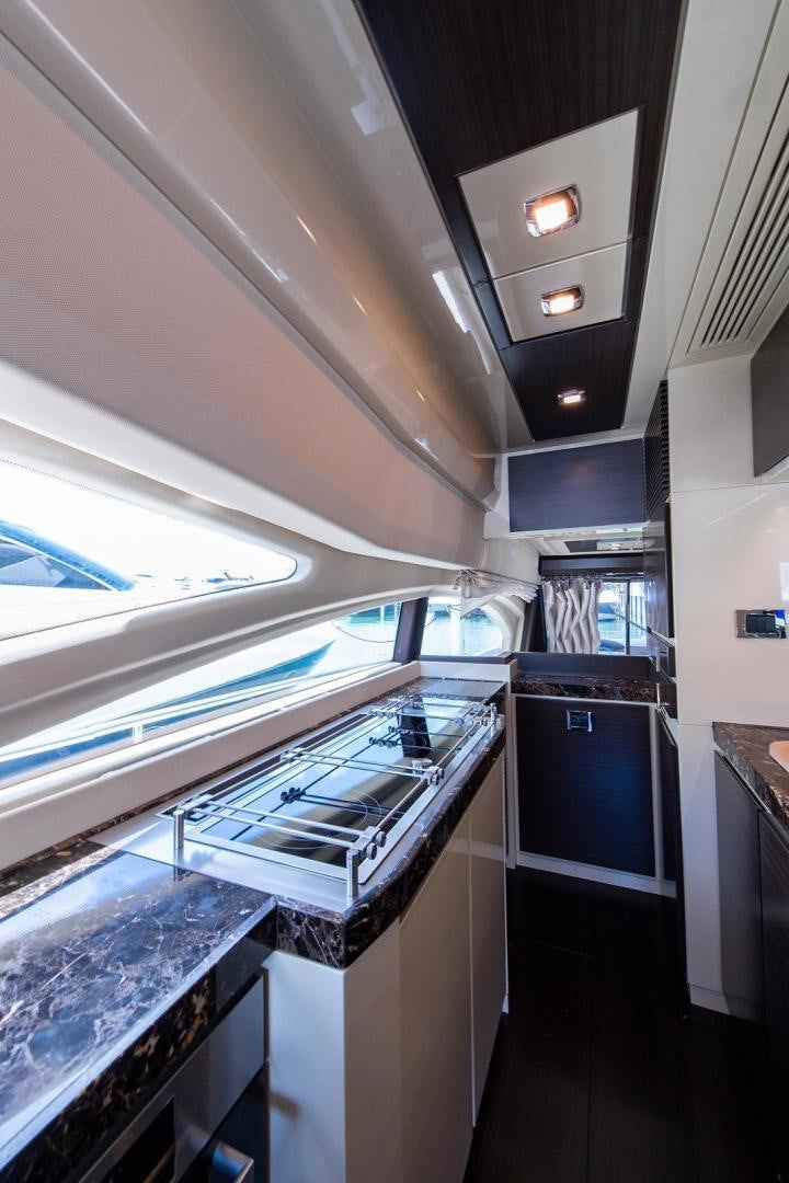 a kitchen with a large oven aboard SOMEWHERE I BELONG Yacht for Sale