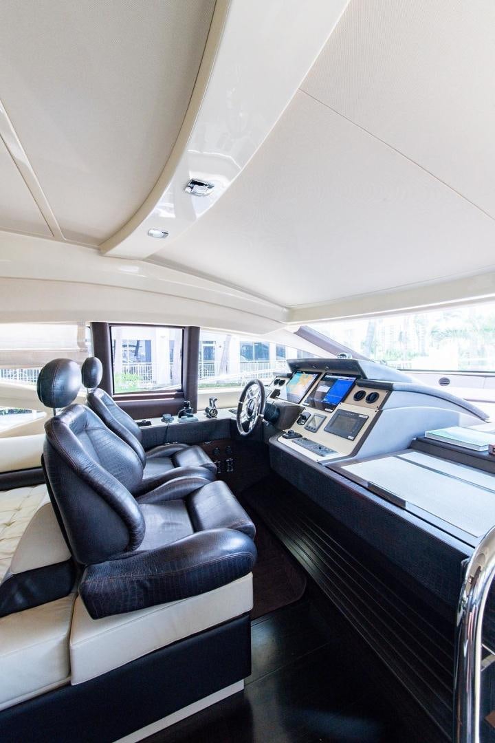 inside of a car aboard SOMEWHERE I BELONG Yacht for Sale