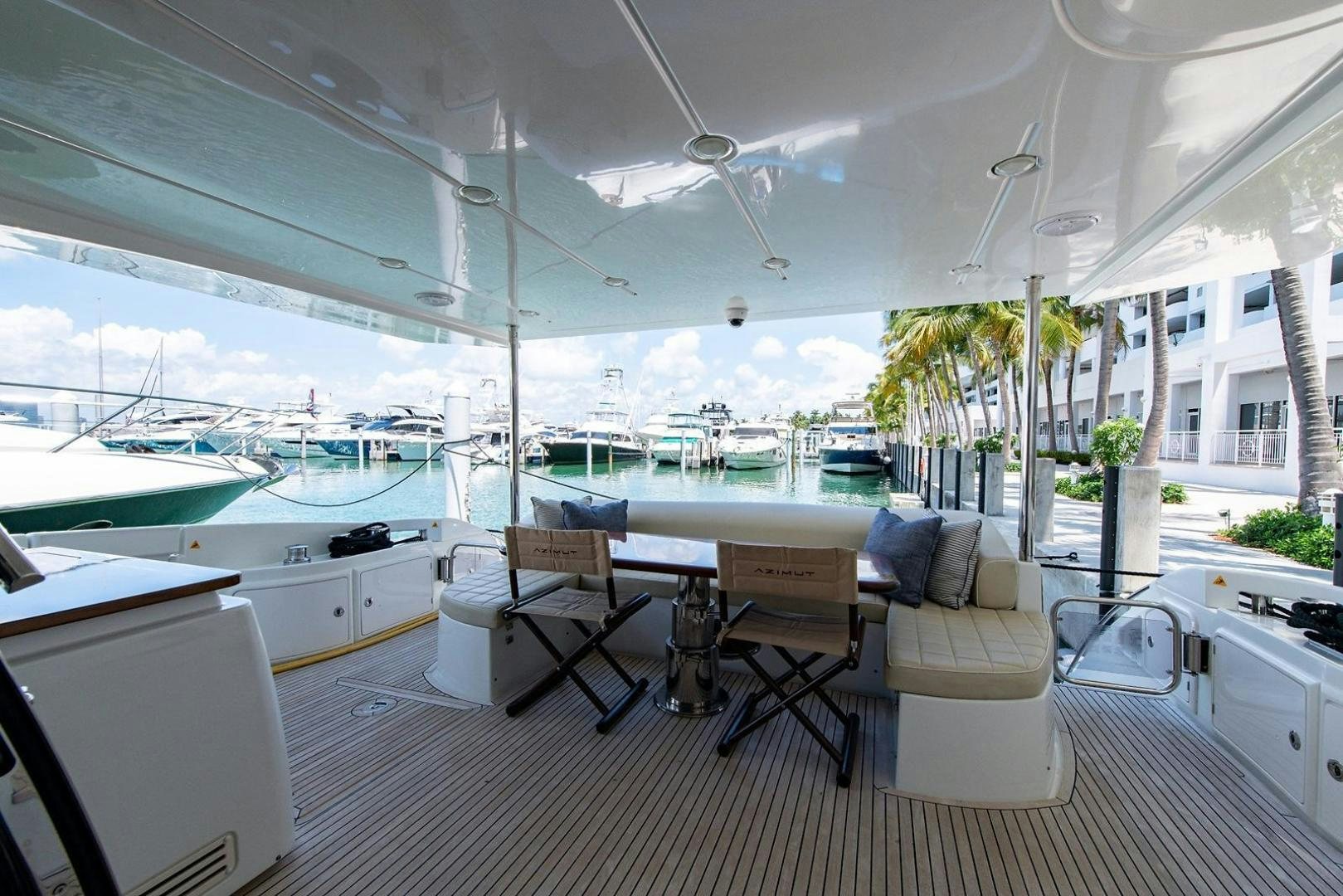 a room with a view of the water and the city aboard SOMEWHERE I BELONG Yacht for Sale