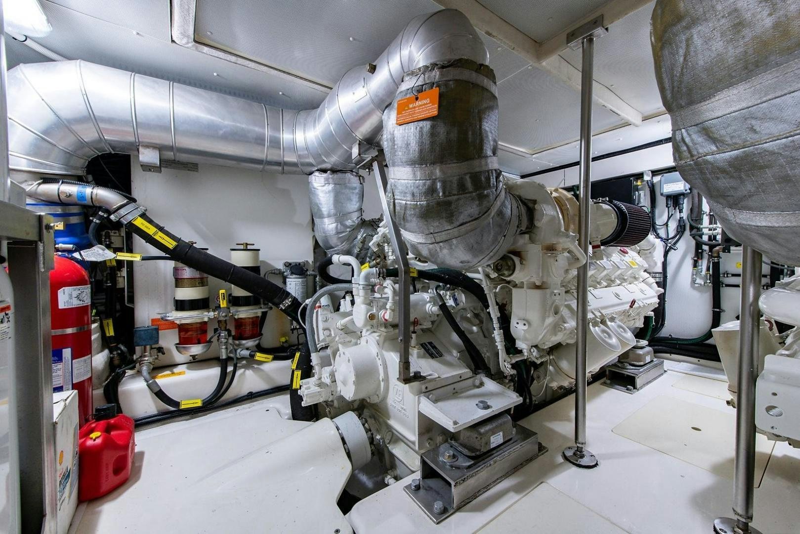 a machine with a large metal cylinder aboard SOMEWHERE I BELONG Yacht for Sale