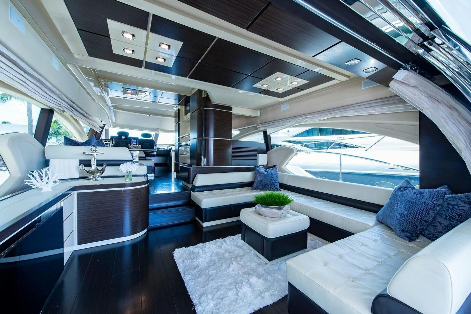 a room with a large glass window aboard SOMEWHERE I BELONG Yacht for Sale
