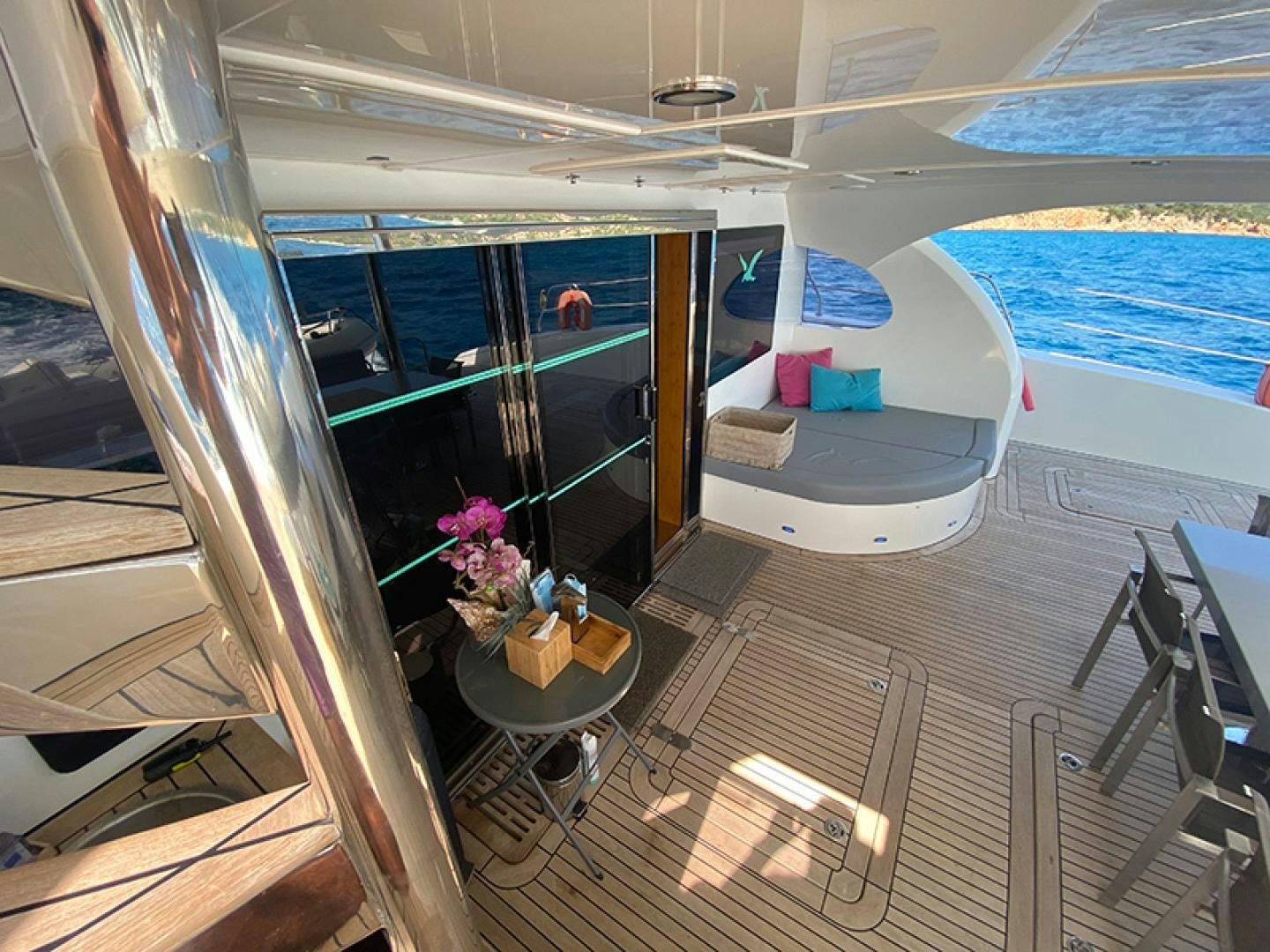 a room with a bed and a table aboard SKYLARK Yacht for Sale