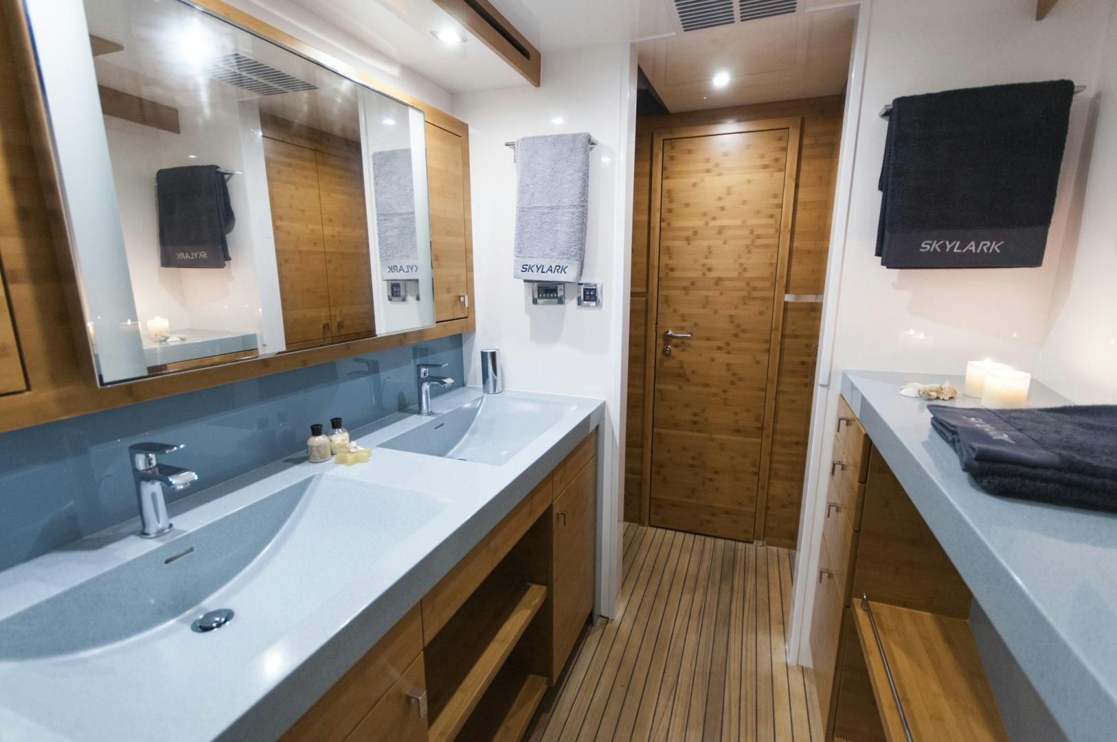 a bathroom with a large mirror aboard SKYLARK Yacht for Sale