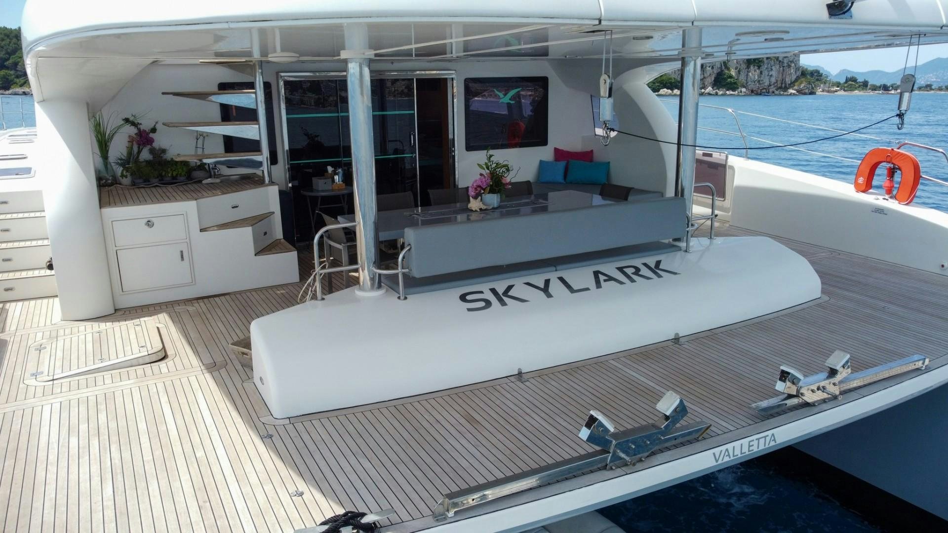 a white boat in a room aboard SKYLARK Yacht for Sale