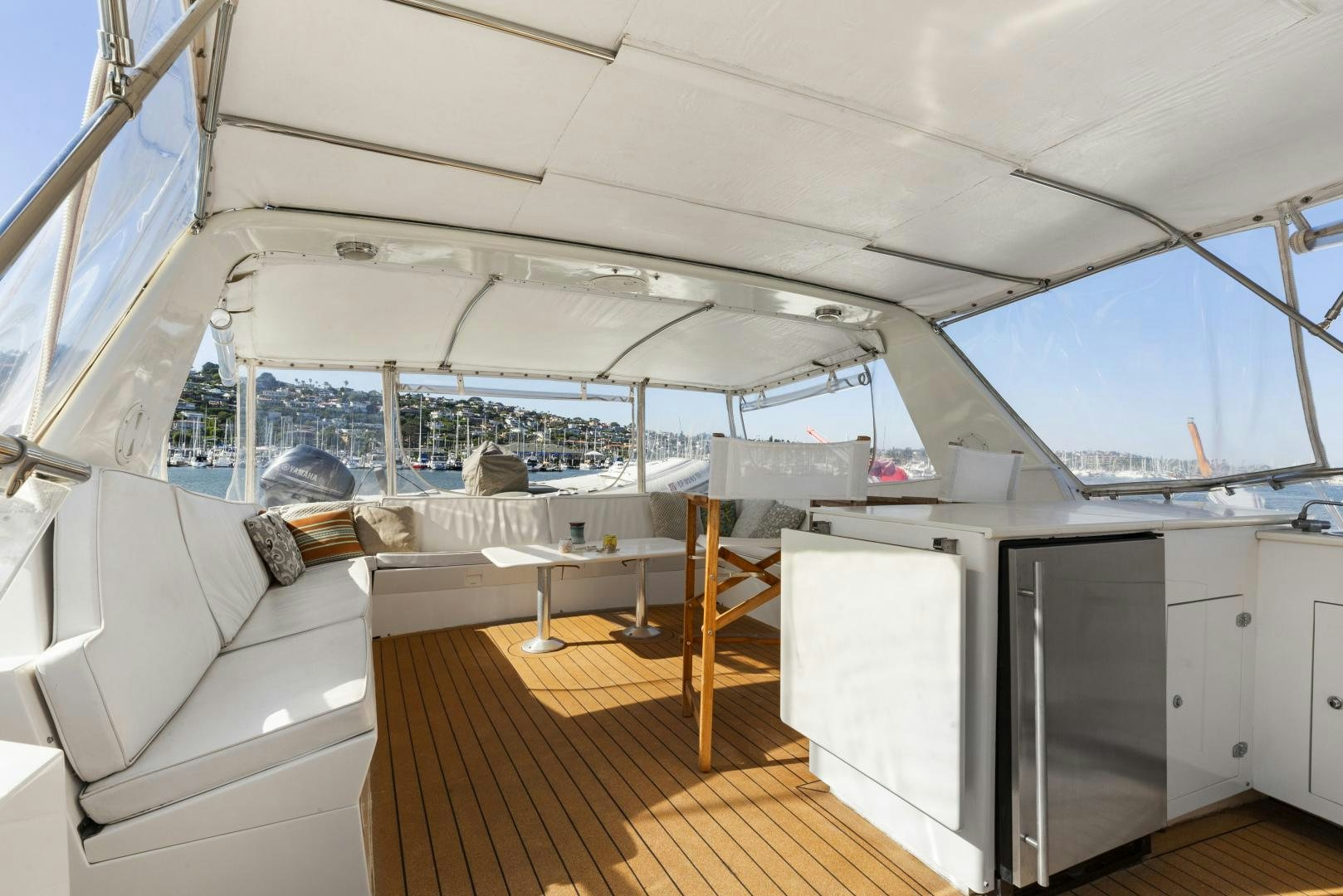a boat with a large deck aboard DAYDREAMER IV Yacht for Sale