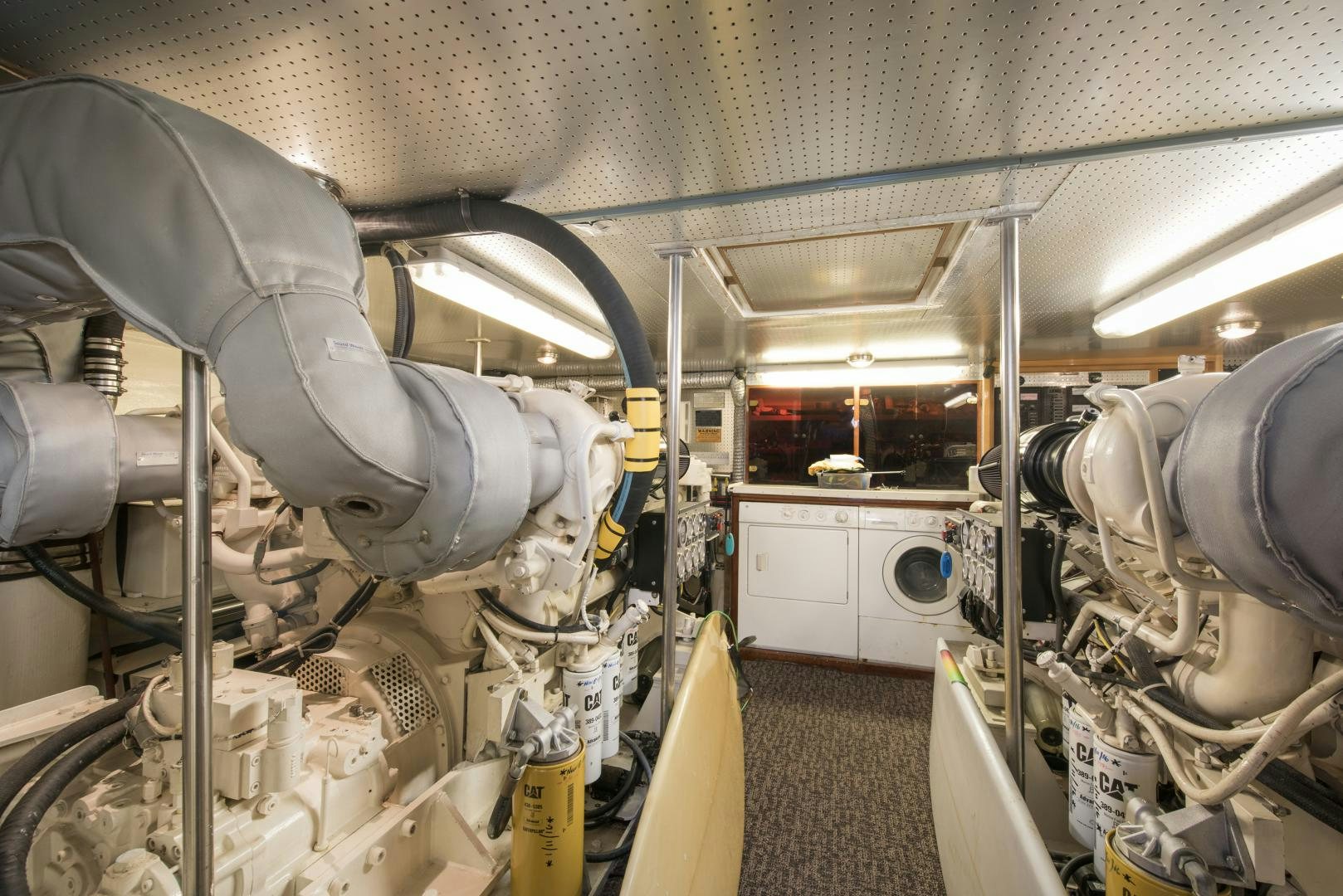 a large machine in a room aboard LEGACY Yacht for Sale