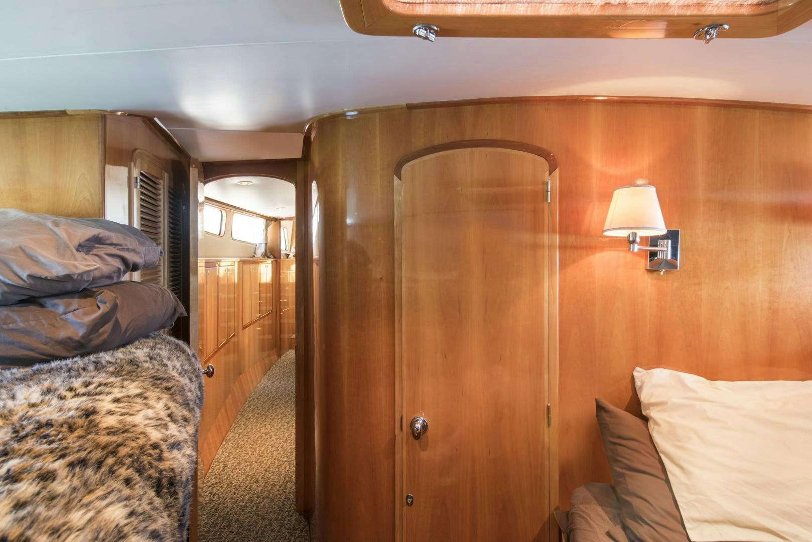 a room with a wood door aboard LEGACY Yacht for Sale
