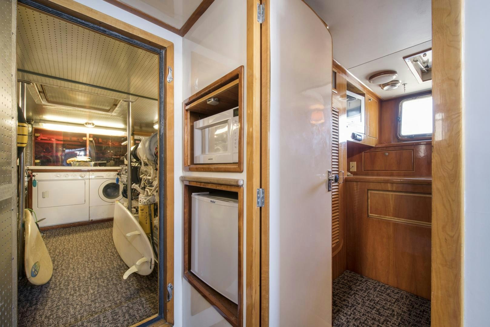a bathroom with a toilet and a sink aboard LEGACY Yacht for Sale