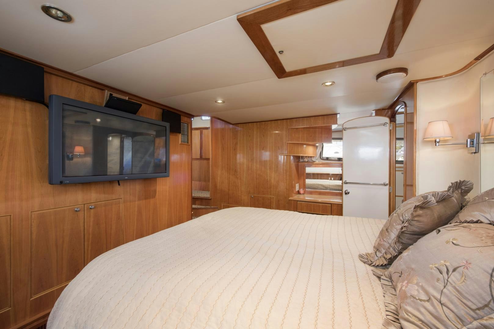 a bed in a room aboard LEGACY Yacht for Sale