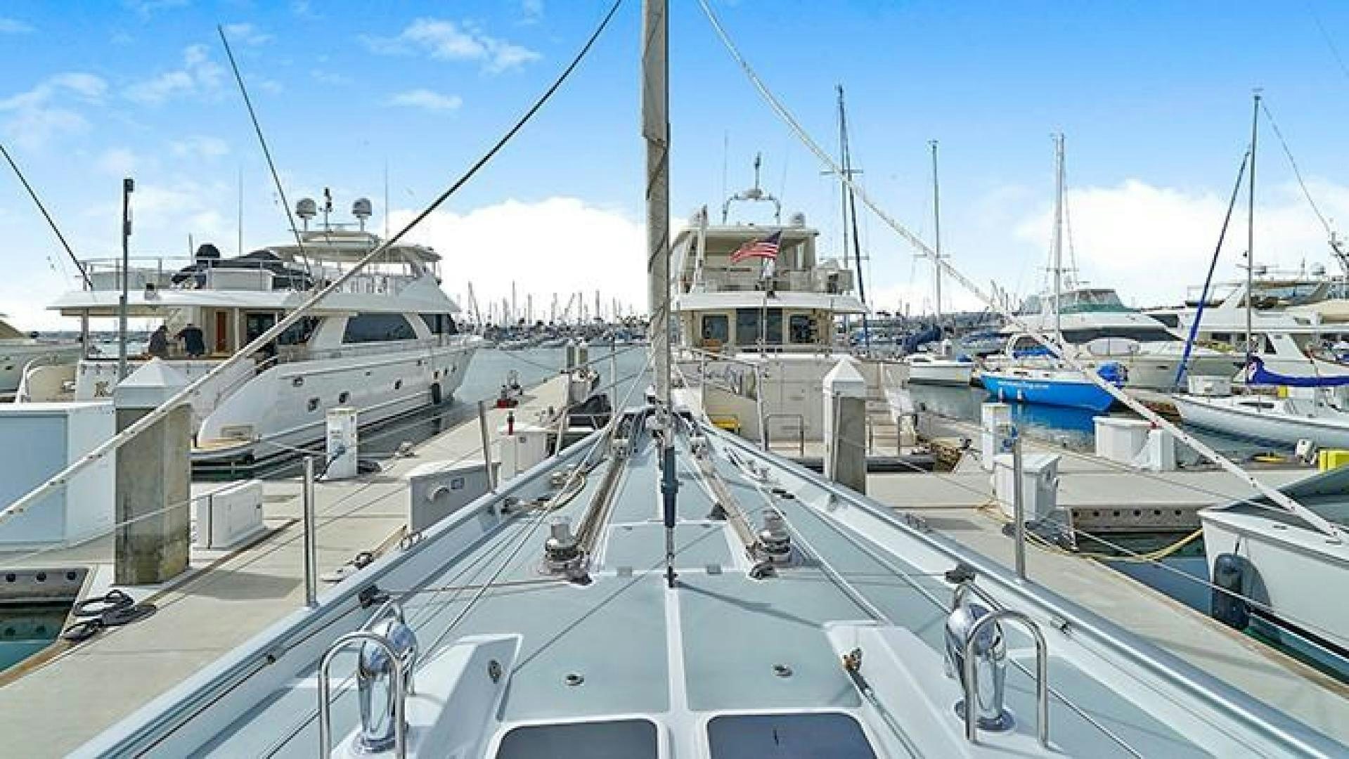 a group of boats are parked in a harbor aboard MAYA Yacht for Sale