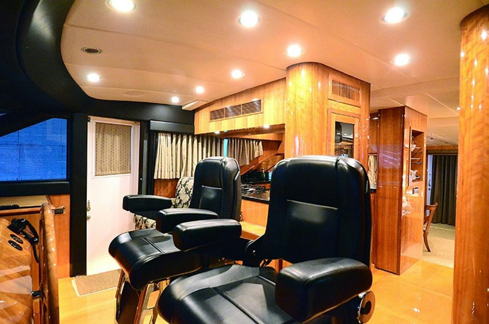 a room with chairs and a table aboard 4 PRINCESSES Yacht for Sale