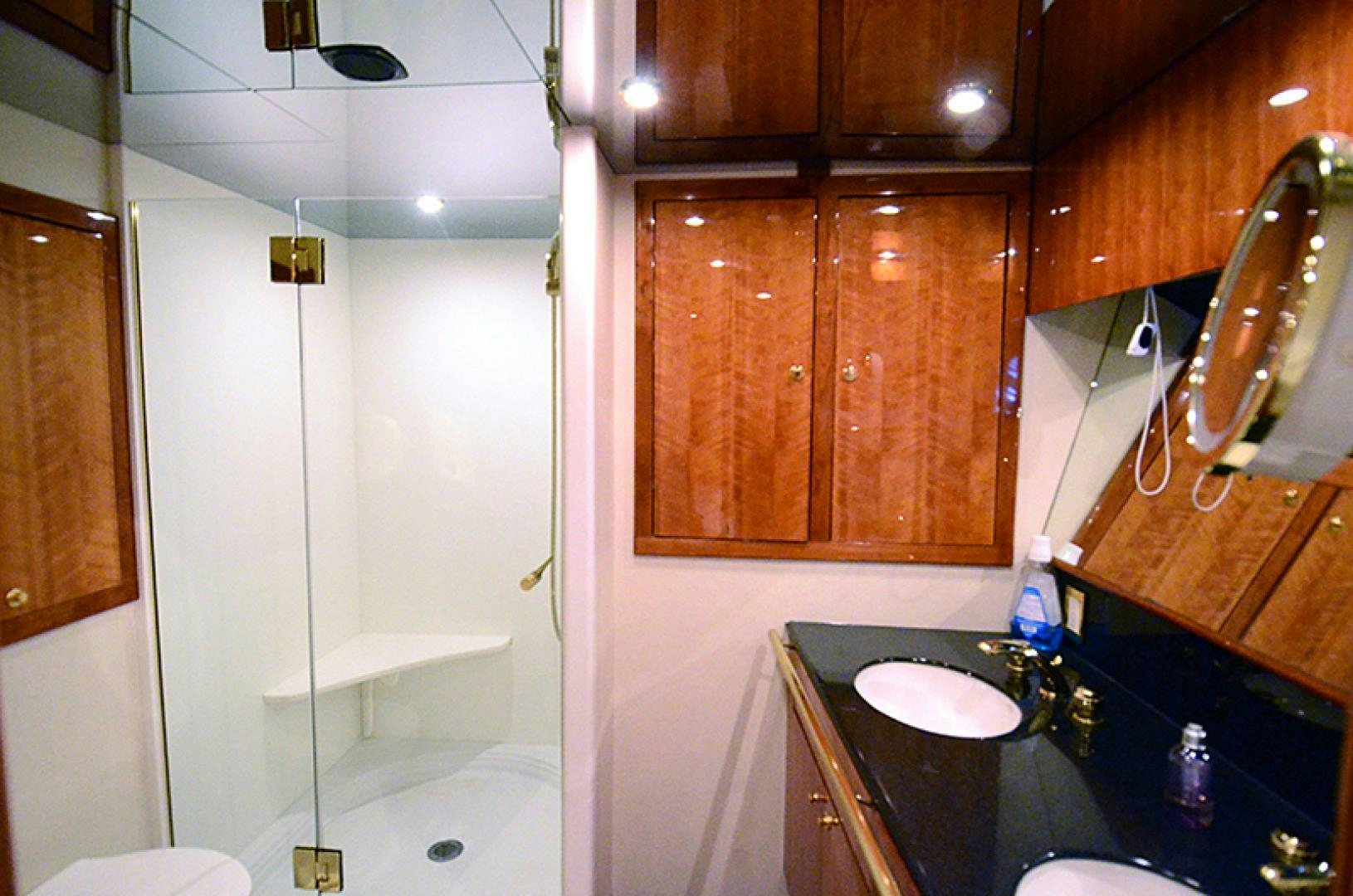 a bathroom with a sink and a bathtub aboard 4 PRINCESSES Yacht for Sale