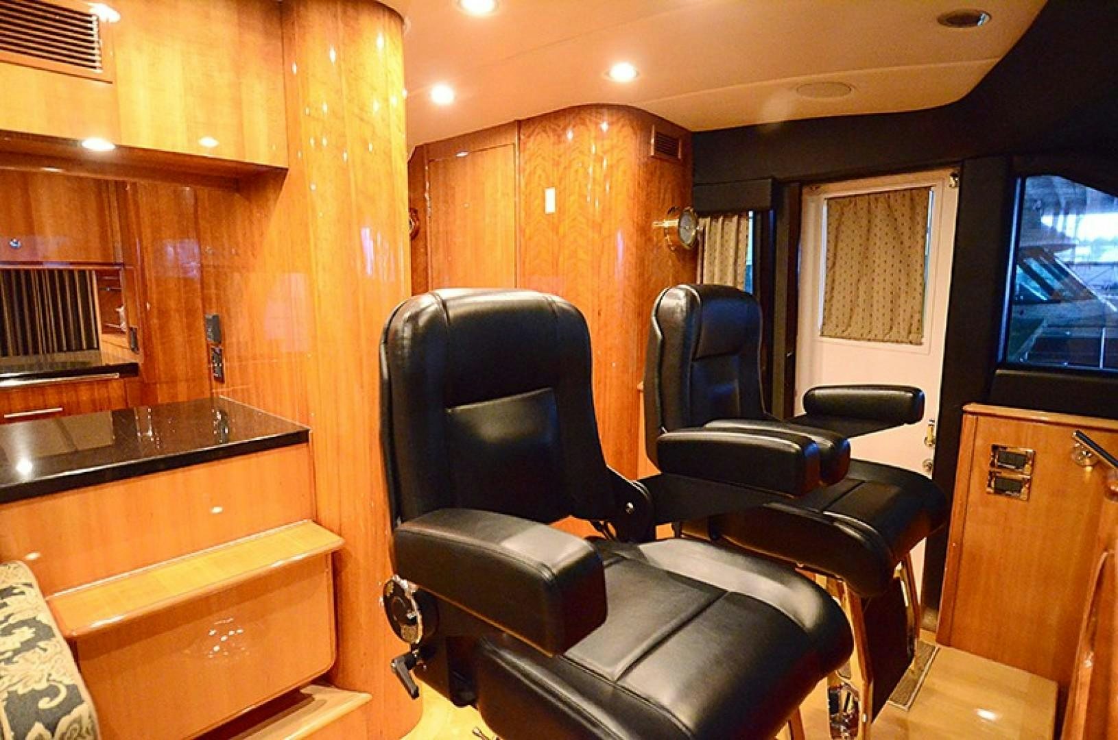 a room with a desk and chairs aboard 4 PRINCESSES Yacht for Sale
