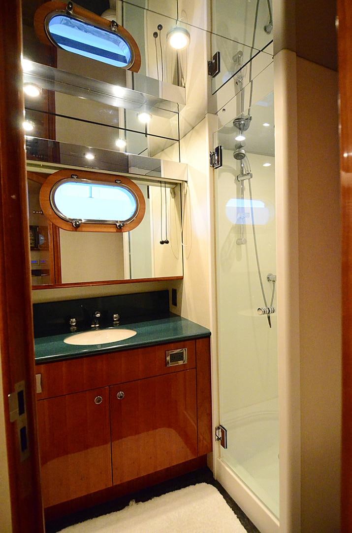 a bathroom with a sink and a mirror aboard 4 PRINCESSES Yacht for Sale