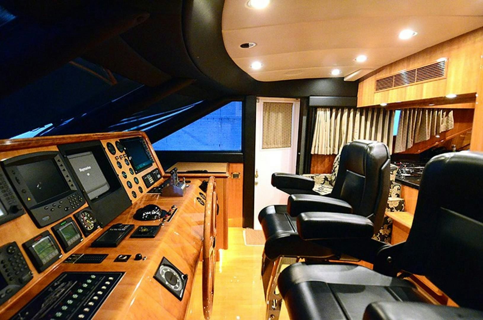 a room with a desk and chairs aboard 4 PRINCESSES Yacht for Sale