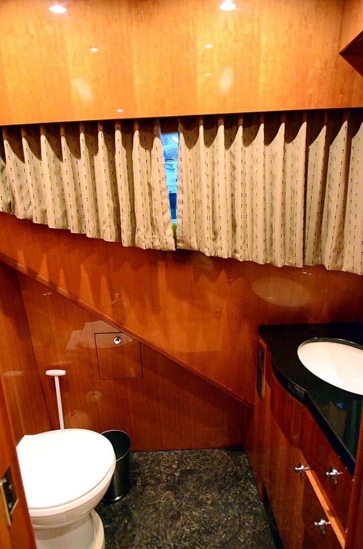 a bathroom with wood walls aboard 4 PRINCESSES Yacht for Sale
