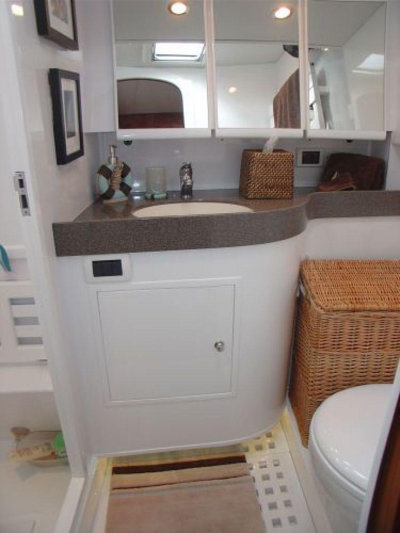 a bathroom with a sink and a mirror aboard amante Yacht for Sale