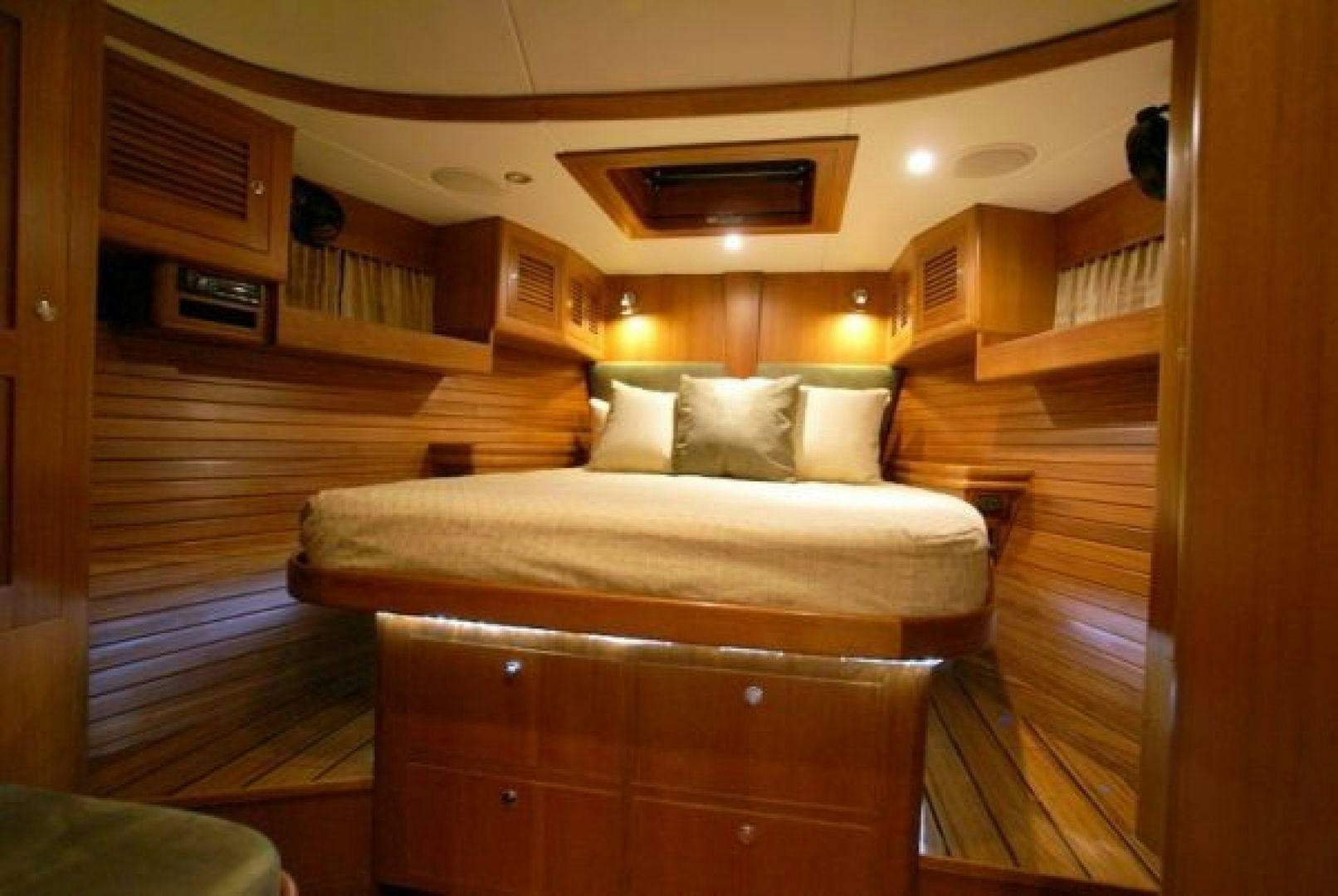 a bed in a room aboard amante Yacht for Sale