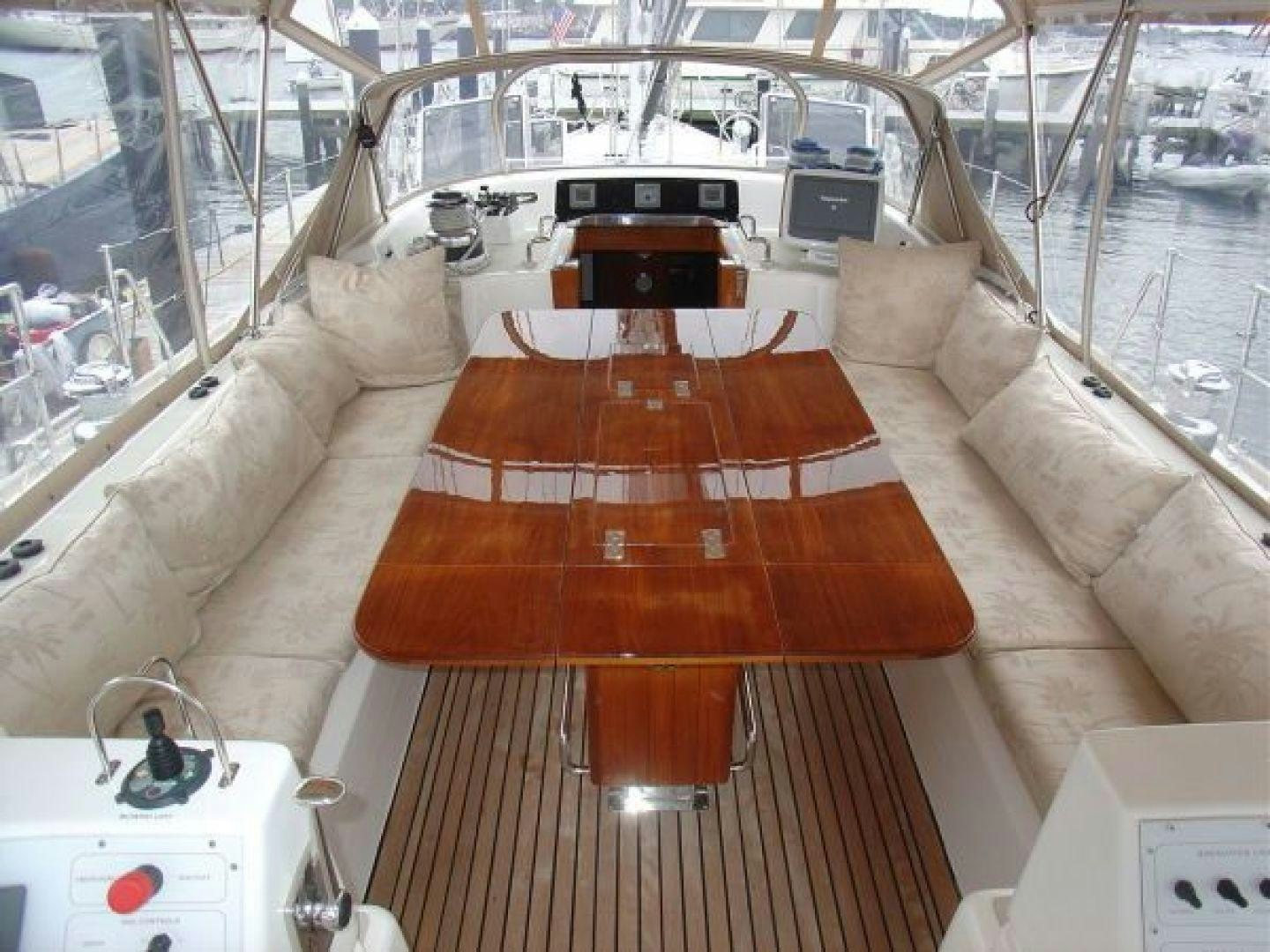 a room with a couch and a table aboard amante Yacht for Sale