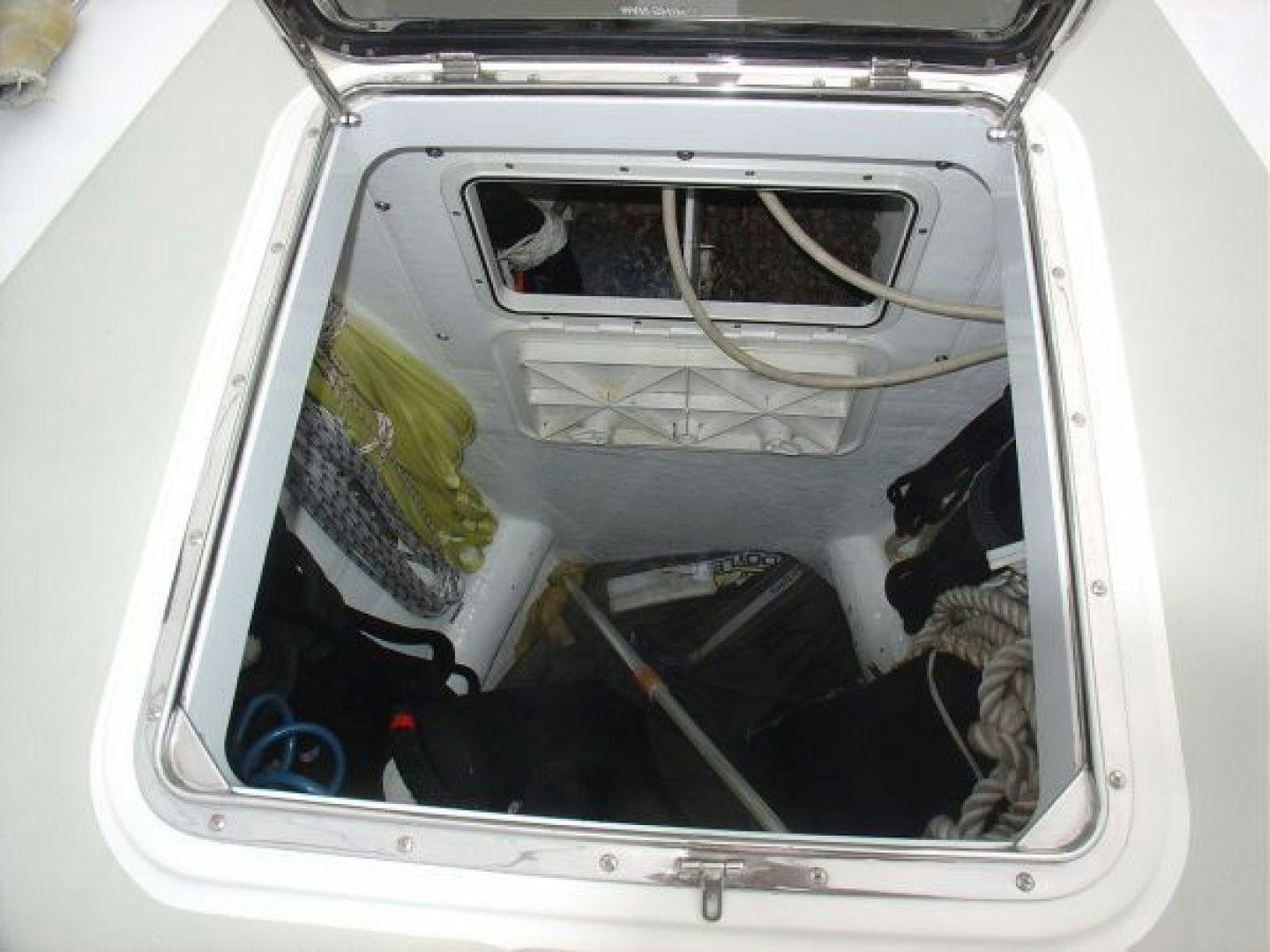 a car with its door open aboard amante Yacht for Sale
