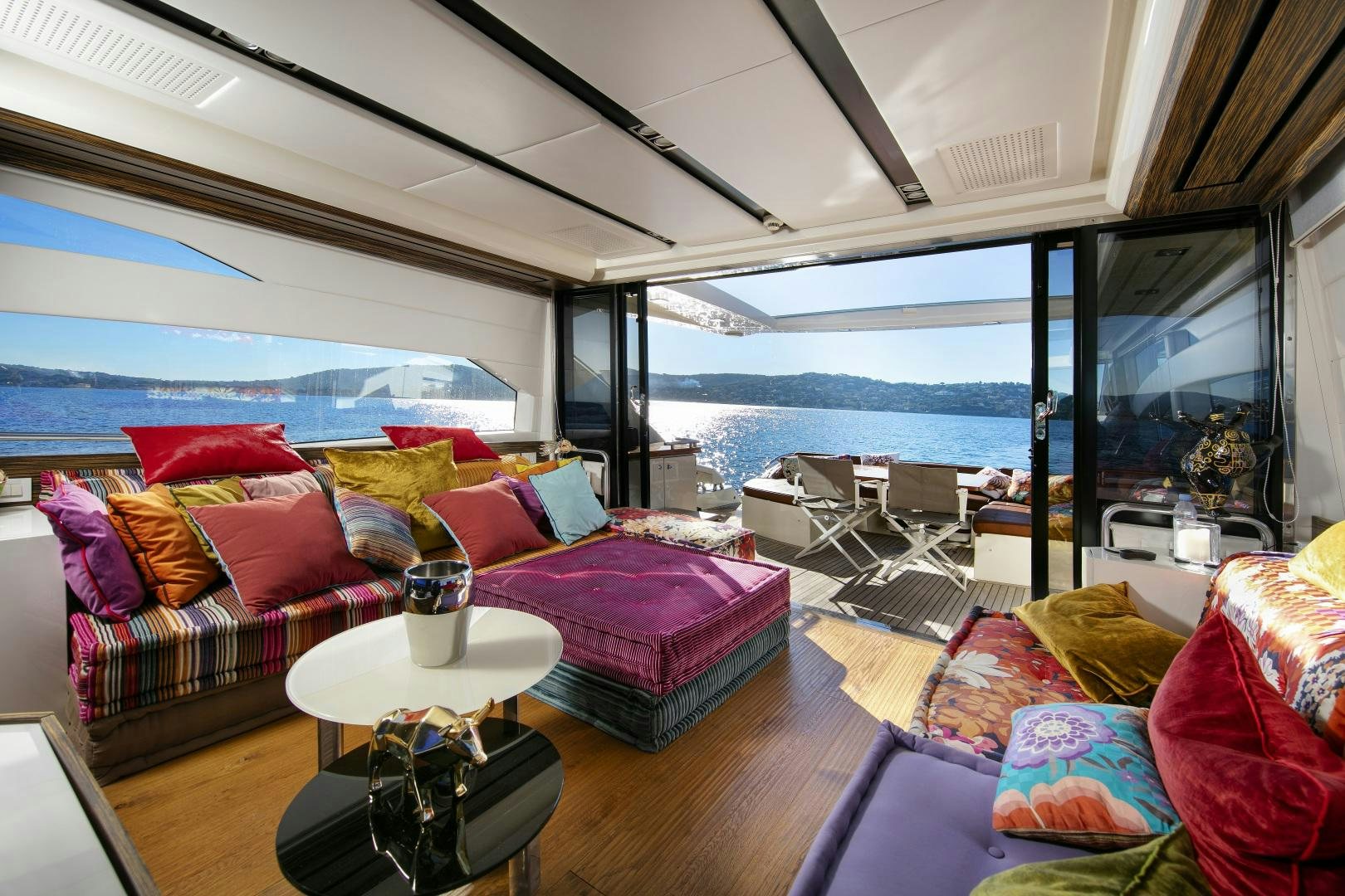 a living room with a large window aboard OCEAN TIGER Yacht for Sale