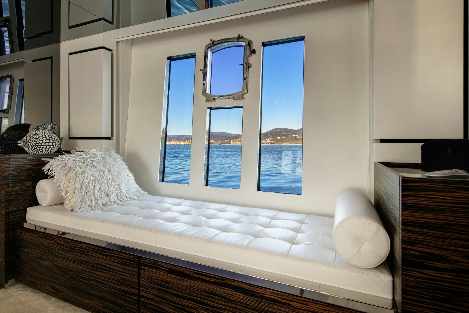 a bed with a white sheet aboard OCEAN TIGER Yacht for Sale