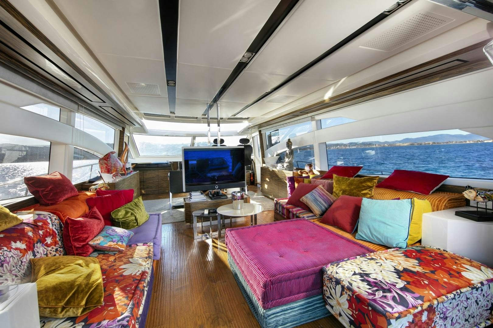 a room with a bed and a tv aboard OCEAN TIGER Yacht for Sale